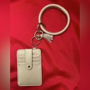 Gold bracelet style card holder